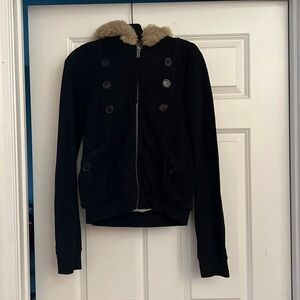 Marc Jacob’s faux fur lined hoodie.